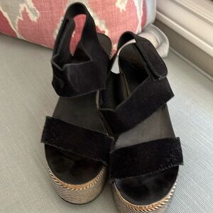 Black and white Pedro Garcia 4” comfortable wedge with rubber bottom